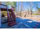 View of the fenced backyard and lower patio area at 2003 Hubbard Ct, Villa Rica, GA 30180