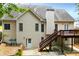 Spacious backyard with deck, stairs, and patio at 2003 Hubbard Ct, Villa Rica, GA 30180