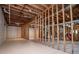 Large unfinished basement offers lots of potential with exposed ceiling and concrete floor at 2003 Hubbard Ct, Villa Rica, GA 30180