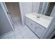Bathroom featuring white cabinets and tile flooring at 2003 Hubbard Ct, Villa Rica, GA 30180