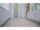 Spacious bathroom featuring tiled floors and dual sinks with plenty of cabinet space at 2003 Hubbard Ct, Villa Rica, GA 30180