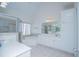 Well-lit bathroom with a soaking tub, walk-in shower, large mirror, and ample counter space at 2003 Hubbard Ct, Villa Rica, GA 30180