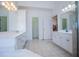 Large bathroom with double vanity, tiled floor, and access to toilet and shower stall at 2003 Hubbard Ct, Villa Rica, GA 30180
