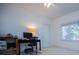 Bright home office with desk, computer, and a window view at 2003 Hubbard Ct, Villa Rica, GA 30180