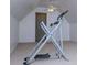 Finished bedroom featuring neutral carpet, a ceiling fan, and exercise equipment at 2003 Hubbard Ct, Villa Rica, GA 30180