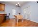 Bright breakfast nook area with hardwood floors, complemented by a window and patio doors at 2003 Hubbard Ct, Villa Rica, GA 30180