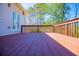 View of deck showcasing wood railings, horizontal wood panels, and a view of the yard at 2003 Hubbard Ct, Villa Rica, GA 30180
