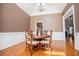 Open dining area with hardwood floors, wainscoting, and natural light at 2003 Hubbard Ct, Villa Rica, GA 30180