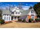 Charming two-story home with brick accents, well-manicured lawn, and inviting curb appeal at 2003 Hubbard Ct, Villa Rica, GA 30180