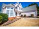 Beautiful two-story home featuring well-maintained landscaping and a welcoming front entrance at 2003 Hubbard Ct, Villa Rica, GA 30180