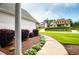 Beautiful curb appeal with a landscaped walkway leading to the well-maintained home at 2003 Hubbard Ct, Villa Rica, GA 30180