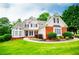 Charming two-story home with a well-manicured lawn and inviting curb appeal at 2003 Hubbard Ct, Villa Rica, GA 30180