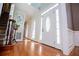 Grand foyer entrance featuring hardwood floors and a stunning front door with sidelights at 2003 Hubbard Ct, Villa Rica, GA 30180