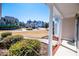 Inviting front porch view showcasing the neighborhood and well-kept landscaping at 2003 Hubbard Ct, Villa Rica, GA 30180