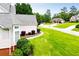 Landscaped front yard with lush lawn and well-maintained shrubbery at 2003 Hubbard Ct, Villa Rica, GA 30180
