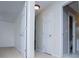 This hallway features neutral carpeting and multiple doors at 2003 Hubbard Ct, Villa Rica, GA 30180