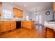 Bright kitchen features wooden cabinets, countertops and hardwood flooring; ample storage and workspace at 2003 Hubbard Ct, Villa Rica, GA 30180