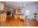 Bright, spacious kitchen featuring wooden cabinets, modern appliances, and hardwood floors at 2003 Hubbard Ct, Villa Rica, GA 30180