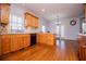 Spacious kitchen with hardwood floors, bright cabinets, and stainless appliances at 2003 Hubbard Ct, Villa Rica, GA 30180