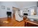 Bright living room with hardwood floors, fireplace, and neutral tones at 2003 Hubbard Ct, Villa Rica, GA 30180