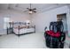Spacious bedroom featuring a trey ceiling, a ceiling fan and carpet at 2003 Hubbard Ct, Villa Rica, GA 30180