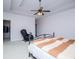 Cozy bedroom featuring carpet, a ceiling fan, and walk in closet at 2003 Hubbard Ct, Villa Rica, GA 30180