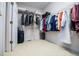 Spacious walk-in closet featuring built-in shelving and ample storage space for clothing and accessories at 2003 Hubbard Ct, Villa Rica, GA 30180
