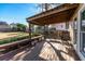 Covered porch featuring a swing and comfortable seating at 2385 Cape Courage Way, Suwanee, GA 30024