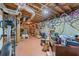Unfinished basement with exposed ceiling, duct work and an elliptical machine at 2385 Cape Courage Way, Suwanee, GA 30024
