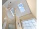 Bright bathroom featuring skylights and decorative lighting fixtures at 2385 Cape Courage Way, Suwanee, GA 30024