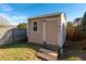Backyard storage shed with ramp and window at 2385 Cape Courage Way, Suwanee, GA 30024