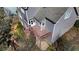 Aerial view of a home's spacious back deck, featuring a painted wood finish and offering a space for outdoor enjoyment at 325 Morning Mist Walk, Suwanee, GA 30024