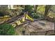 The fenced backyard features tiered landscaping and a slide, perfect for outdoor play and relaxation at 325 Morning Mist Walk, Suwanee, GA 30024