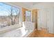 Bright bathroom featuring a soaking tub with jets and a separate shower enclosure at 325 Morning Mist Walk, Suwanee, GA 30024