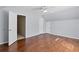 Hardwood bedroom featuring multiple doorways at 325 Morning Mist Walk, Suwanee, GA 30024