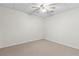 Cozy bedroom featuring carpet, bright light, and a ceiling fan at 325 Morning Mist Walk, Suwanee, GA 30024