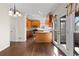 This home features a kitchen with wooden cabinets, stainless appliances and eat-in area with deck access at 325 Morning Mist Walk, Suwanee, GA 30024