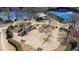 Aerial view of community playground and tennis courts at 325 Morning Mist Walk, Suwanee, GA 30024