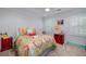 Cozy bedroom has a ceiling fan, windows with shutters, and colorful accents at 4160 Westchester Ne Xing, Roswell, GA 30075