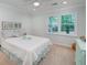 Comfortable bedroom with natural light, neutral walls and a hardwood window trim at 4160 Westchester Ne Xing, Roswell, GA 30075