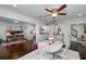 Bright dining room features hardwood floors, neutral walls, and classic white trim at 4160 Westchester Ne Xing, Roswell, GA 30075