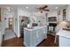 Charming kitchen with a center island, stainless steel appliances, and white cabinetry at 4160 Westchester Ne Xing, Roswell, GA 30075