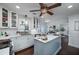 Lovely kitchen with island, white cabinets, marble countertops, and stainless appliances at 4160 Westchester Ne Xing, Roswell, GA 30075