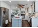 Bright kitchen with stainless steel appliances, marble countertops, and a stylish center island at 4160 Westchester Ne Xing, Roswell, GA 30075