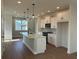 Modern kitchen with a large island, stainless steel appliances, and ample cabinet space at 1915 Cassia Aly, Kennesaw, GA 30144
