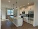 Spacious kitchen with island, stainless steel appliances, and pendant lighting at 1915 Cassia Aly, Kennesaw, GA 30144