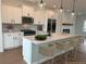 Modern kitchen featuring a large island, stainless steel appliances, and white cabinetry at 1915 Cassia Aly, Kennesaw, GA 30144