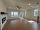 Bright, spacious living room featuring recessed lighting and an electric fireplace at 1915 Cassia Aly, Kennesaw, GA 30144