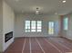 Bright living room with modern fireplace and ample natural light at 1915 Cassia Aly, Kennesaw, GA 30144