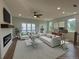 Bright living room with fireplace, large windows, and stylish decor at 1915 Cassia Aly, Kennesaw, GA 30144